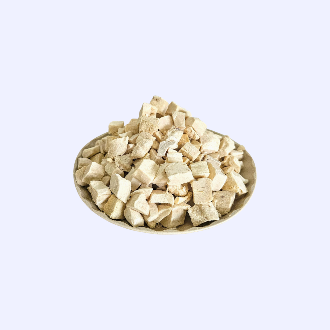 Single-ingredient freeze-dried chicken treat cubes, close-up