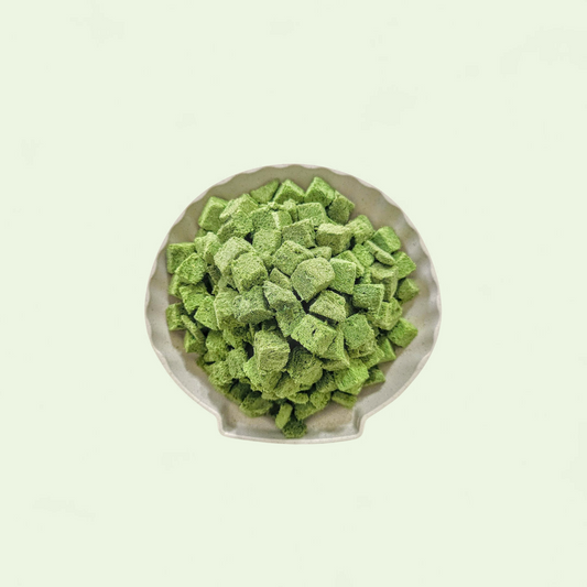 Close-up of natural freeze-dried catgrass cubes for cat digestion