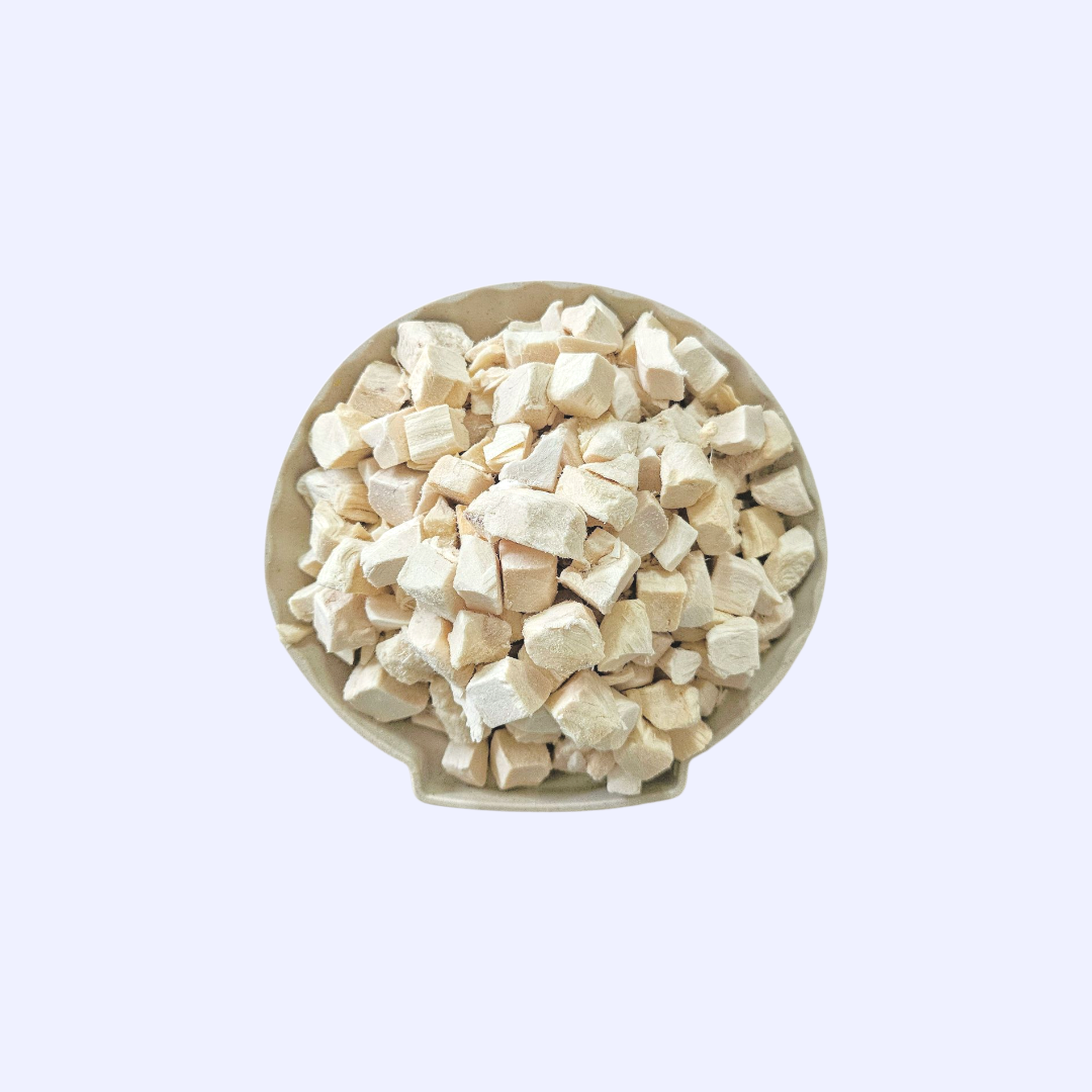 Single-ingredient freeze-dried chicken treat cubes, close-up